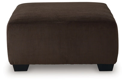 Kimlee - Sectional And Ottoman Set