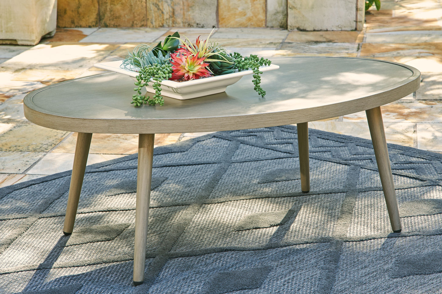 Swiss Valley - Beige - Oval Cocktail Table